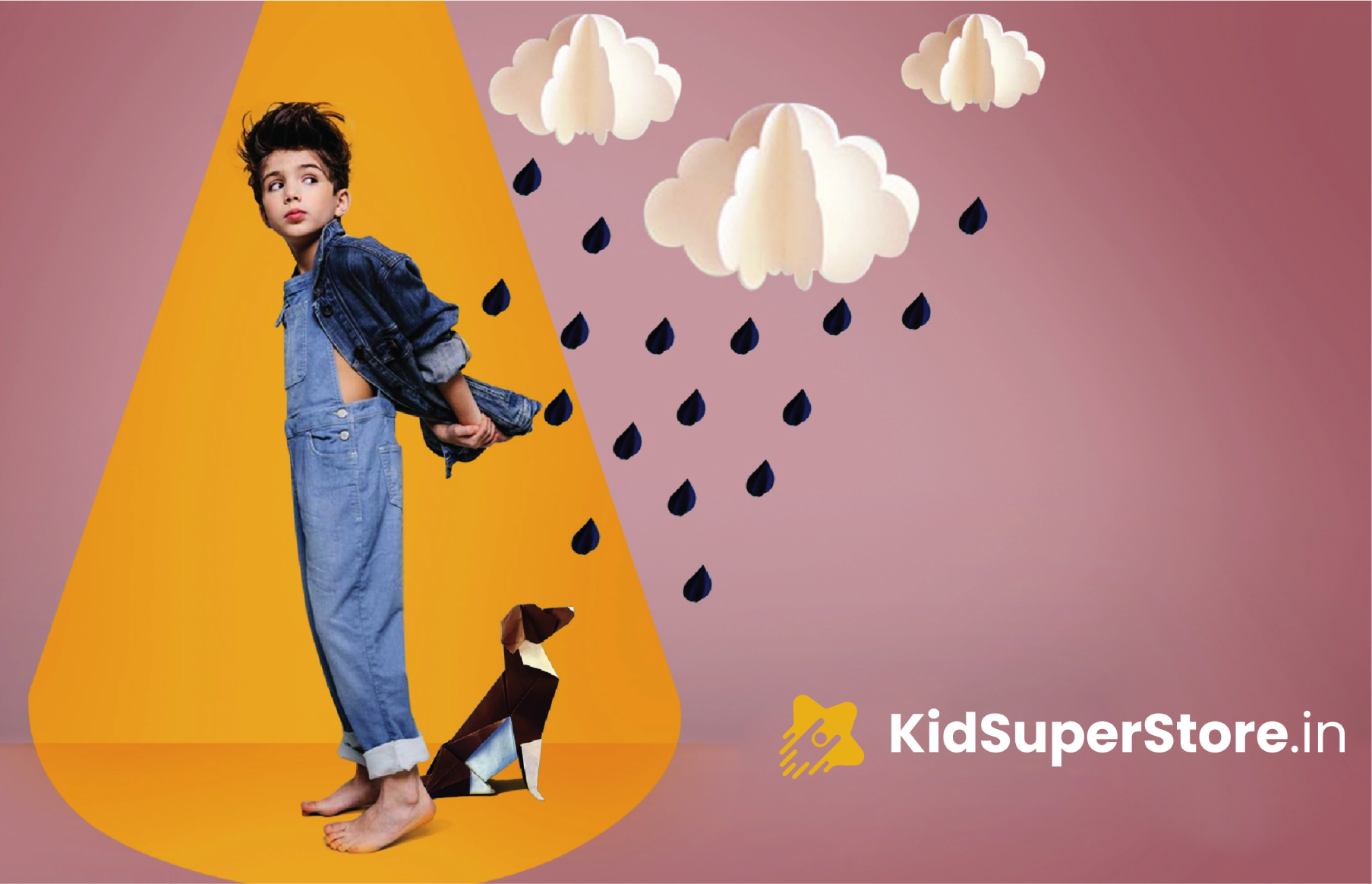 KidSuperStore.in advertisement featuring child in denim with dog under yellow umbrella shape amid rain clouds.