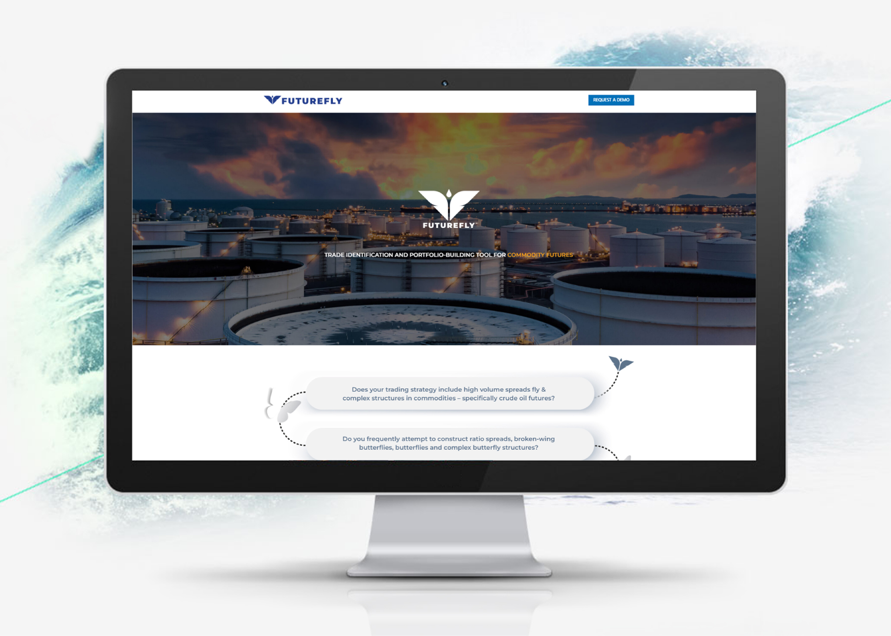 Computer monitor showing FutureFly website with commodity futures trading tools and oil storage facility hero image