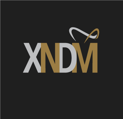 XNDM logo in silver and gold letters on black background with curved decorative element above.