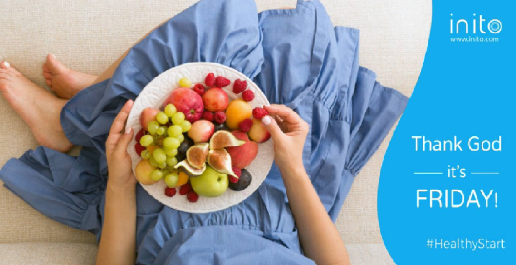 Person in blue dress holding a plate of fresh fruits on a couch with "Thank God it's Friday!" and #HealthyStart text.