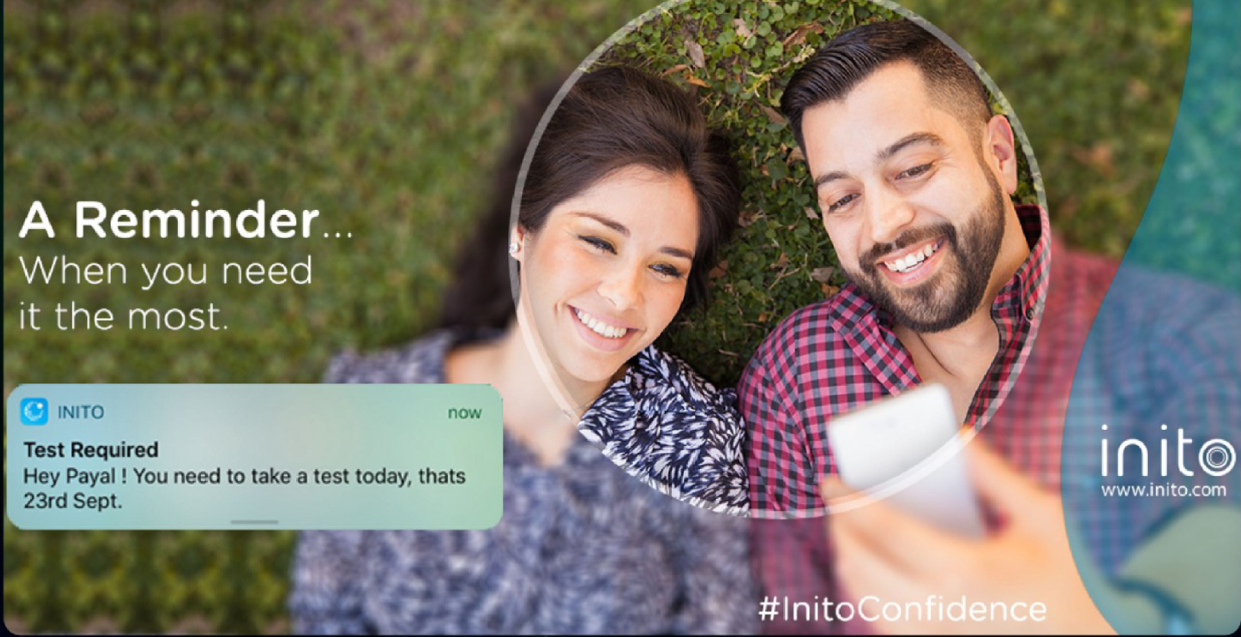 Couple lying on grass, one holding a phone with an INITO test reminder notification, and text about timely reminders and confidence.