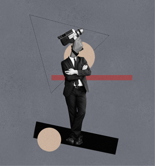 A man in a suit stands with crossed arms, with a video camera for a head, on a geometric abstract background.