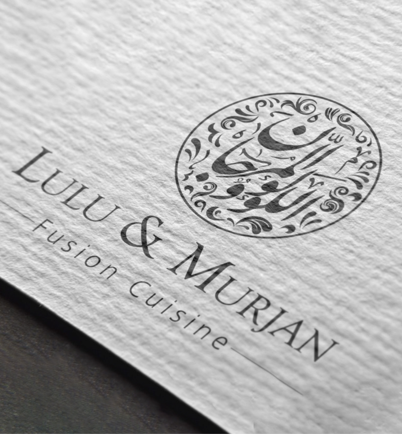Elegant Lulu & Murjan Fusion Cuisine logo with ornate Arabic calligraphy inside a decorative circular border on textured paper.