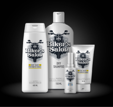 Four Biker's Salon personal care products—body wash, dry shampoo, face wash, and serum—on a black background.