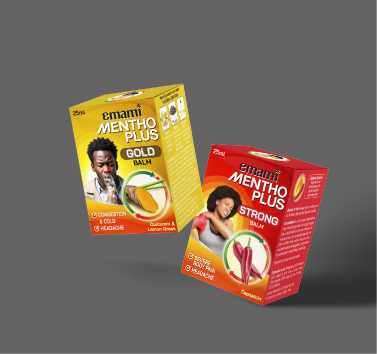 Emami Mentho Plus Gold Balm and Strong Balm boxes for headache and cold relief on a plain gray background.