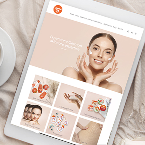 A tablet displays Creme 21 skincare website with product categories and a woman posing on the homepage.