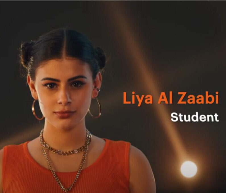 Portrait of young woman "Liya Al Zaabi - Student" with orange text overlay and dramatic lighting.