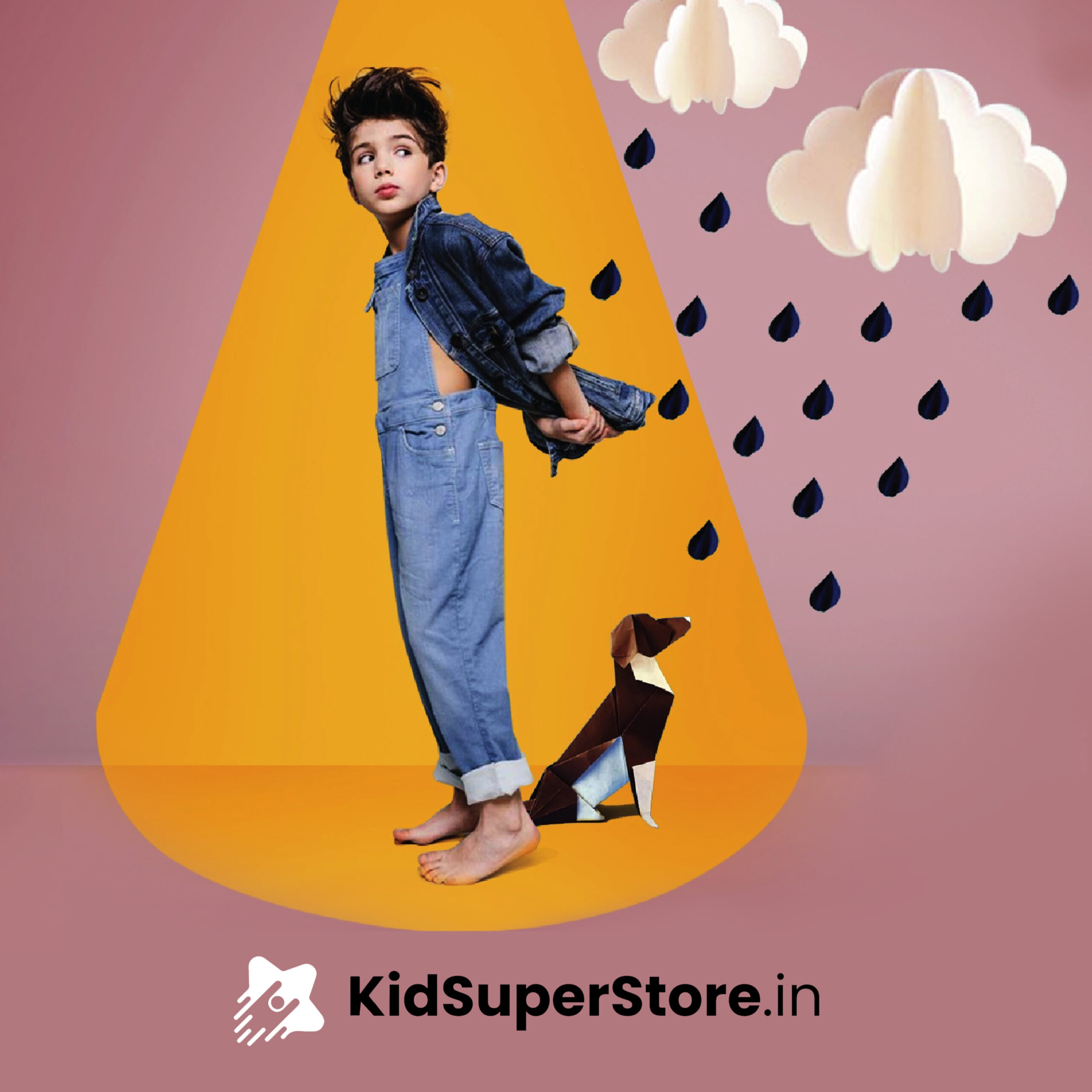 Child in denim overalls and a jacket stands with an origami dog, with clouds and raindrops, KidSuperStore.in logo below.