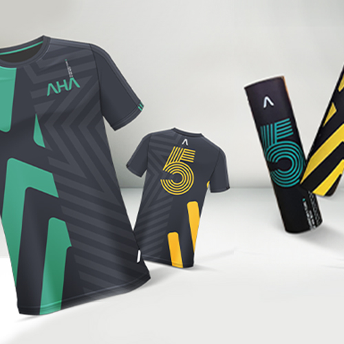 Sporty AHA shirts with geometric designs and a large "5" on the back, next to matching accessories.